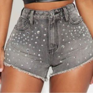 Black denim studded shorts